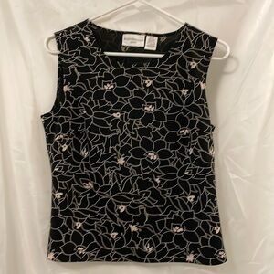 Blouse. Black and cream. Size petite medium. Brand Worthington petite.